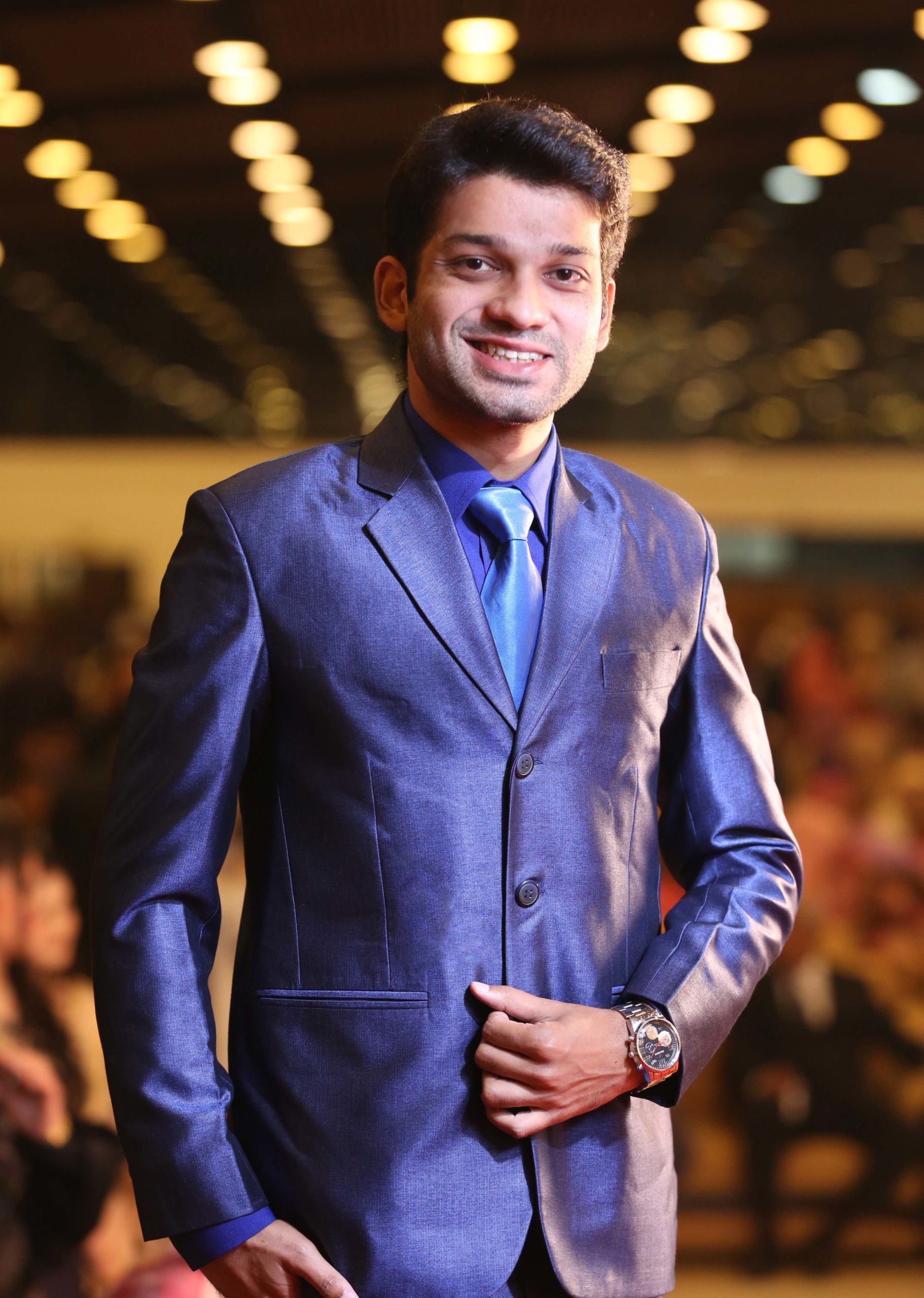 photograph of internet entrepreneur Ismail Zakaria dressed professionally in a suit